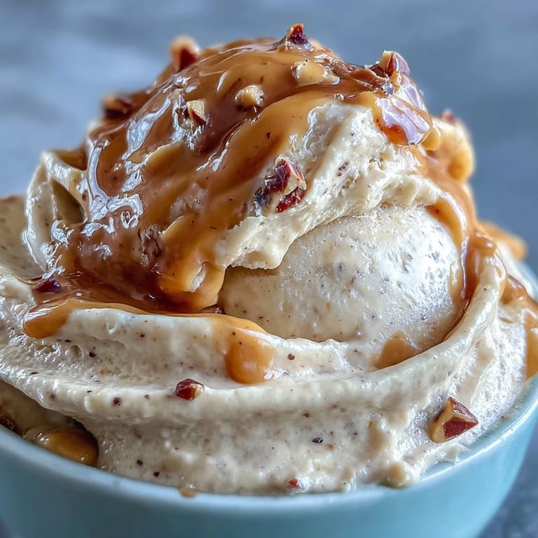 Velvety banana peanut butter ice cream served in a bowl, perfect for a healthy vegan dessert.