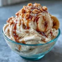 Creamy peanut butter banana ice cream with swirls of rich peanut butter and sweet ripe bananas.  
